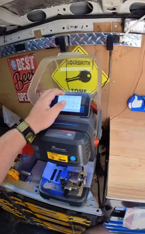 Cleveland Heights Locksmith 2 Automotive Cleveland Heights locksmith unlocking a car door and replacing lost car keys